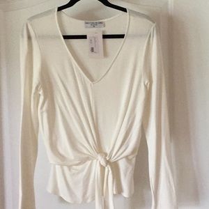 NWT a beautiful ivory boutique blouse!